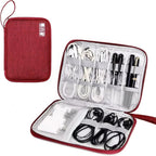 Red travel case with compartments for electronic accessories on a white background