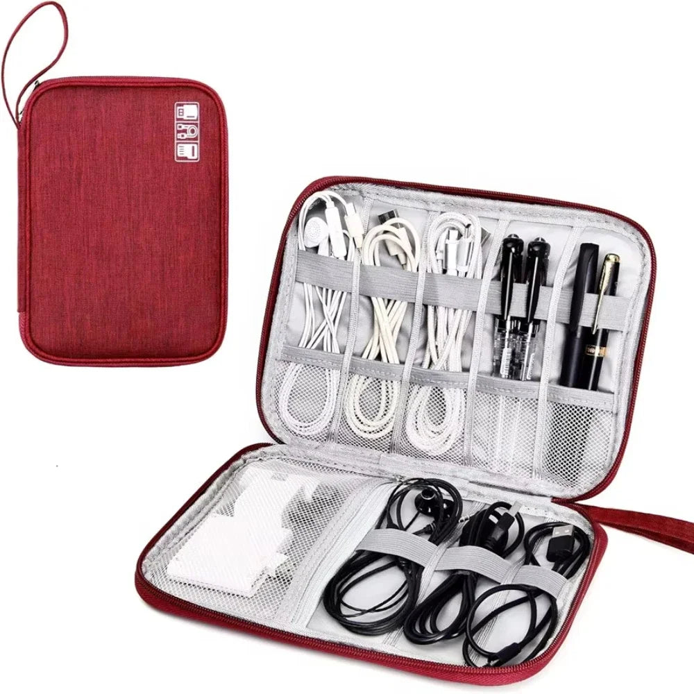 Red travel case with compartments for electronic accessories on a white background
